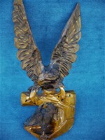 Carved wooden eagle statue