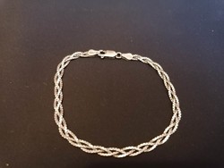Sign silver braided bracelet (made of cube eyes)