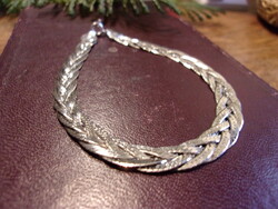 Silver four-strand braided bracelet