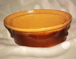 French-glazed earthenware pot with oval handle, baking dish