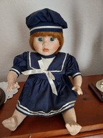 Charming porcelain doll