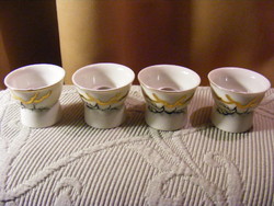 4 porcelain sake glasses with magnifying erotic pictures on the bottom
