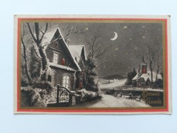 Old Christmas postcard 1941 postcard evening snowy street scene