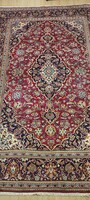 Hand-knotted Keshan Persian rug with patina