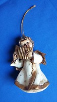 Christmas angel with a whistle