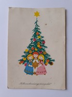 Old Christmas postcard. Postcard with a Christmas tree motif
