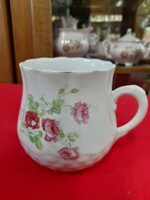 Old porcelain mug with flower pattern. Marked.