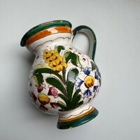 Old white hand-painted ceramic mug, jug