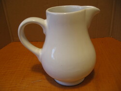 White ceramic milk jug