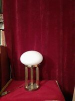 Art deco style copper table lamp with a milky white shade