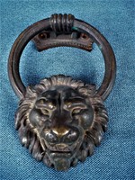 Huge copper lion head door knocker