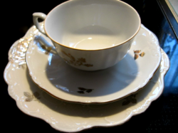 Antique gilded cup with matching small plate