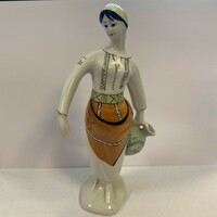 Porcelain girl with jug