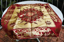 Festive gold-burgundy tablecloth