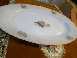 A large bowl with an oval rose pattern, heat-resistant, milk glass, with a Jena face