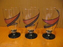 3 colorfully painted pedestal vases with soft drinks and beer glasses in one.