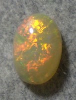 Oval cabochon-cut, natural Australian fire opal