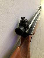 Air rifle with scope