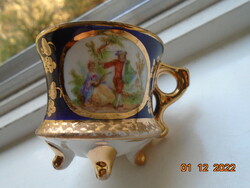 Altwien cobalt gold mocha cup on 4 legs, hinged scene, gold stylized grape pattern
