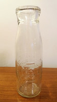 Old little milk bottle from Budapest head. Mother and baby institute milk bottle