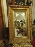 Huge polished, painted mirror specialty in carved wooden frame