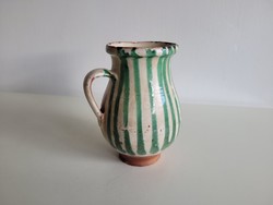 Old Csákvár striped earthenware pitcher with green glaze