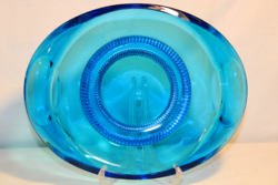 Blue glass table centerpiece, offering