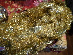 Shiny, gold, retro boa. I didn't roll it down, but according to my calculations, it can be about 8-10 m.