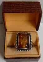 Old, well-preserved condition, marked master-marked silver ring with a large set amber stone in a box