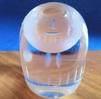 Small solid glass happy face desk piece