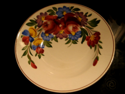 Antique town with a rosy, pansies wall plate