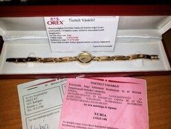 Swiss women's gold watch in 14k box with papers, like new