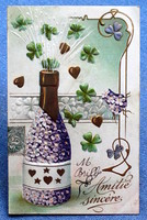 Antik dombornyomott Újévi üdvözlő litho  képeslap pezsgős üveg virágból 4levelű lóhere