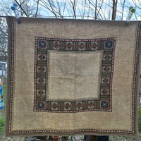 Woven, embroidered bedspread