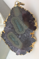 Amethyst-agate geode slice pendant in a gilded metal frame