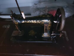 Make an offer on it! Antique Ossa brand sewing machine with hidden drawers. With cast iron legs - 357