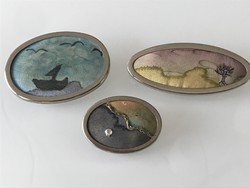 Hand-dyed silk brooches in a steel frame