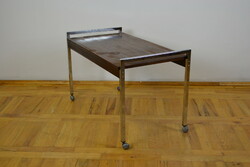 Mid-century rolling coffee table with chrome frame