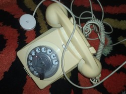 Retro dial telephone in butter color