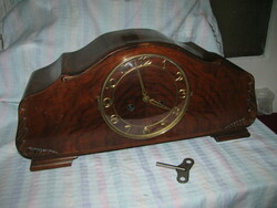 Mantel clock with a special shape, oven for sale in perfect working condition.
