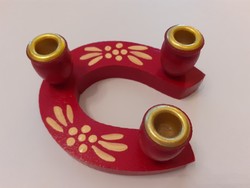Retro New Year horseshoe shaped candlestick with wooden lucky horseshoe
