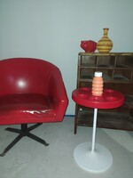 Red swivel armchair retro design