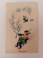 Old Christmas postcard 1965 picture postcard of children sledding