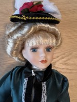 Porcelain head doll with its own box