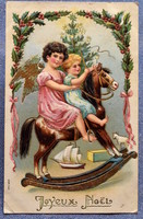 Antik dombornyomott  Karácsonyi üdvözlő képeslap kisgyerek hintalovon angyallal karácsonyfa játékok
