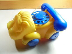Retro colorful plastic toy dial landline telephone lion rolling figure
