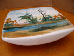 Hand-painted landscape on a porcelain bowl and soap dish