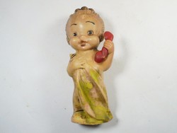 Retro rubber whistle toy figure peddler - little girl calling telephone - from the 1970s
