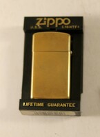 ZIPPO aranyozott öngyújtó tartójában 486
