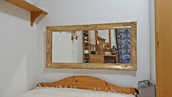 (W) 63 x 131 cm. Antique gold colored mirror with blonde frame.